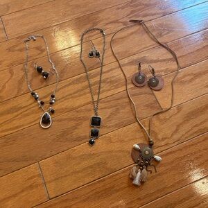 bundle of necklaces with matching earrings